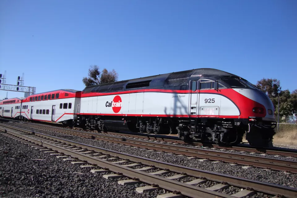 White and red Caltrain commuter train
